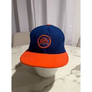 VTG EA sports cap New Era Blue & orange size 7 3/8 “it’s in the game”